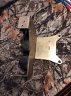 909391 Tilt Bracket With Solenoids Omc. Fixed Price $45.00.